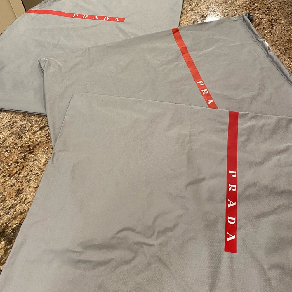 3 Waterproof Prada bags for shoes and 1 bag